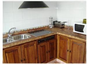 Kuchyň nebo kuchyňský kout v ubytování Casa Las Truchas