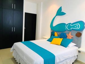 Postel nebo postele na pokoji v ubytování Valdivia Suites