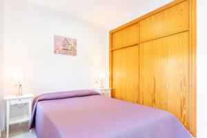 Posteľ alebo postele v izbe v ubytovaní Altea Villa Buraux , Apartamento con vistas al mar & parking en el corazón del casco viejo de Altea