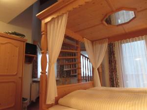 Postel nebo postele na pokoji v ubytování Landhaus Paradies Samnaun Spiss