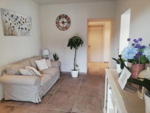 Posezení v ubytování La Casa Tra Gli Ulivi