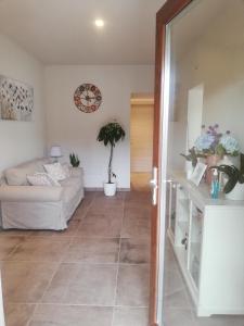 Posezení v ubytování La Casa Tra Gli Ulivi