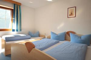 Ένα ή περισσότερα κρεβάτια σε δωμάτιο στο Pension Fundus