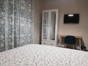 TV a/nebo společenská místnost v ubytování La Casa Tra Gli Ulivi