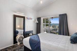 Postel nebo postele na pokoji v ubytování Lake Lodge Motel Rotorua + 35 fotografií