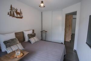 Krevet ili kreveti u jedinici u okviru objekta SUPERB apt with BALCONY in BRIANÇON