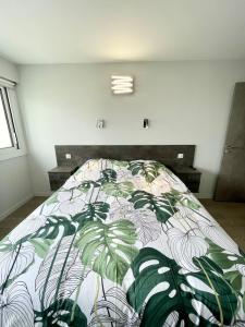 Ένα ή περισσότερα κρεβάτια σε δωμάτιο στο ROYAL ! Appartement de standing Face à l'océan !