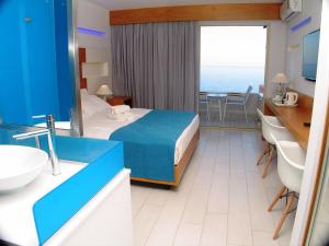 Postel nebo postele na pokoji v ubytování Europa Resort Hotel