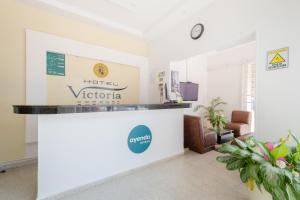 a lobby of a hospital with a reception desk at Ayenda Victoria Comfort in Bucaramanga