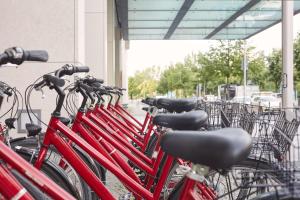 a row of bikes parked next to each other at Scandic Berlin Potsdamer Platz in Berlin
