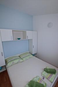 Ліжко або ліжка в номері Solaria Apartments Porec