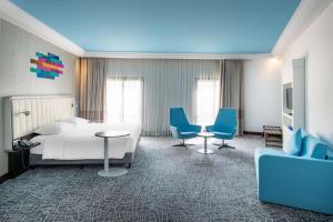 Postel nebo postele na pokoji v ubytování Park Inn by Radisson Makkah Al Naseem