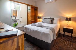 Кровать или кровати в номере Peddlars Rest