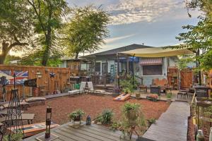a house with a backyard with a deck and a patio at La Villa By The Riverwalk in San Antonio