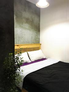 Postel nebo postele na pokoji v ubytování Lanna Hostel
