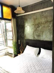Postel nebo postele na pokoji v ubytování Lanna Hostel + 23 fotografií