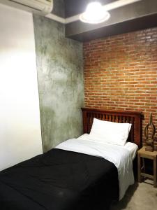 Postel nebo postele na pokoji v ubytování Lanna Hostel