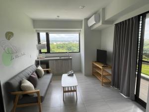 TV a/nebo společenská místnost v ubytování Golden W Hotel