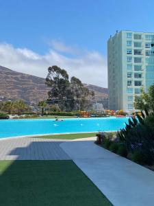 Bazén v ubytování Condominio Papudo Laguna, Piscina, Laguna y Acceso Playa nebo v jeho okolí