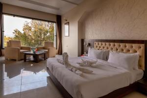 Voodi või voodid majutusasutuse Savitri Resort toas