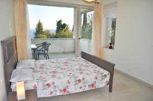 Postel nebo postele na pokoji v ubytování House Lemoni, Apartment C - Pelekas, Corfu