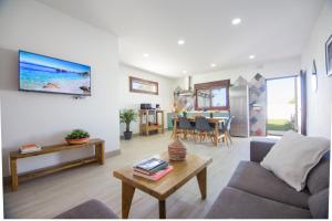 Posedenie v ubytovaní Acogedoras casas Entre Dos Vientos, cerca de la playa