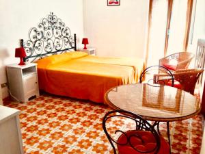 Ένα ή περισσότερα κρεβάτια σε δωμάτιο στο Residence Baia degli Sciti