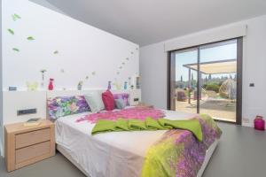 Llit o llits en una habitació de Sa Garriga den Garau
