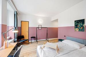 Becozy Self Check-in Pop-Up Hotel Baselにあるベッド