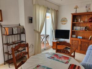 TV a/nebo společenská místnost v ubytování casa relax nudista
