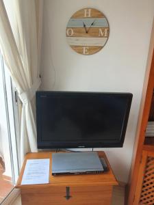 TV a/nebo společenská místnost v ubytování casa relax nudista