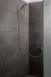 A bathroom at Rivari Santorini Hotel