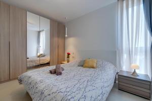 Voodi või voodid majutusasutuse Stunning Apartment in a Central Location with Views toas