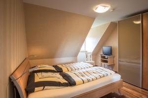 Postel nebo postele na pokoji v ubytování Ida's Hus