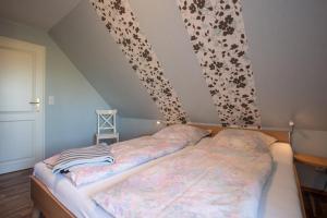 Postel nebo postele na pokoji v ubytování Ida's Hus