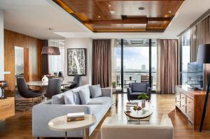 a living room with a couch and a table at Radisson Blu Hotel Istanbul Asia in Istanbul