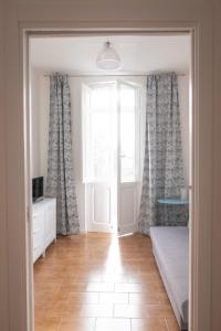 Łóżko lub łóżka w pokoju w obiekcie Casa Alina- Art House