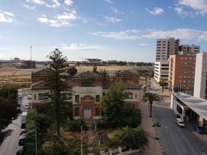 una vista aérea de un edificio en una ciudad en Italia 57, en Huelva