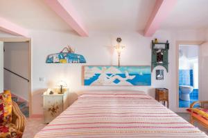 リーパリにあるVilla Garibaldiのベッドルーム1室(大型ベッド1台付)