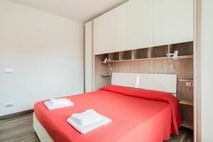 Postel nebo postele na pokoji v ubytování Cremia Suits by Halldis