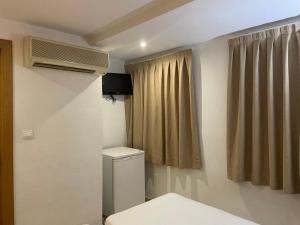 TV a/nebo společenská místnost v ubytování Hostal María
