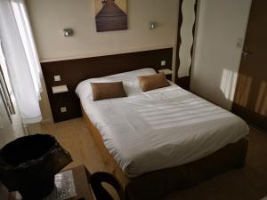 Postel nebo postele na pokoji v ubytování Auberge Les Mufliers - Hôtel Les Forges