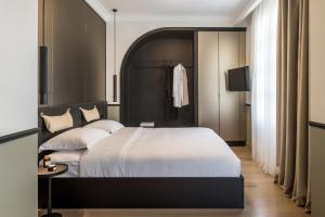 Posteľ alebo postele v izbe v ubytovaní 72 AD Suites