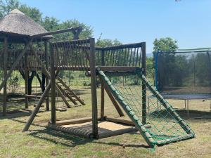 Herní místnost nebo prostor pro děti v ubytování Bossi Lodge