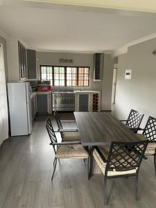 Kuchyň nebo kuchyňský kout v ubytování Bossi Lodge