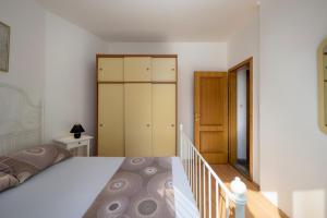 Postel nebo postele na pokoji v ubytování Apartments Lapida