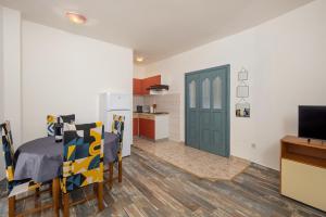Kuchyň nebo kuchyňský kout v ubytování Apartments Lapida