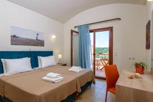 Posteľ alebo postele v izbe v ubytovaní Margarita's Villas + 37 fotografií