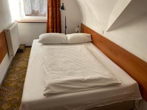 Łóżko lub łóżka w pokoju w obiekcie Hotel Górecki