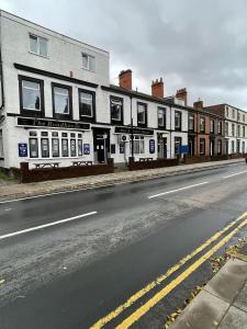 a building on the side of a street at The Roadhouse Hotel in Carlisle